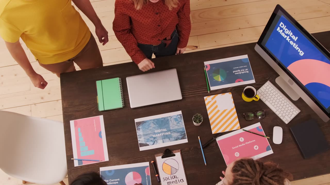 A team working through strategy materials at a table